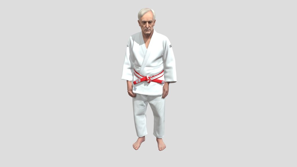 Senior Judoka in White Gi with Red Belt
