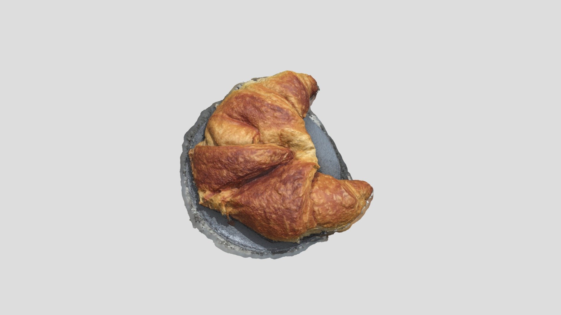 Croissant in a small plate