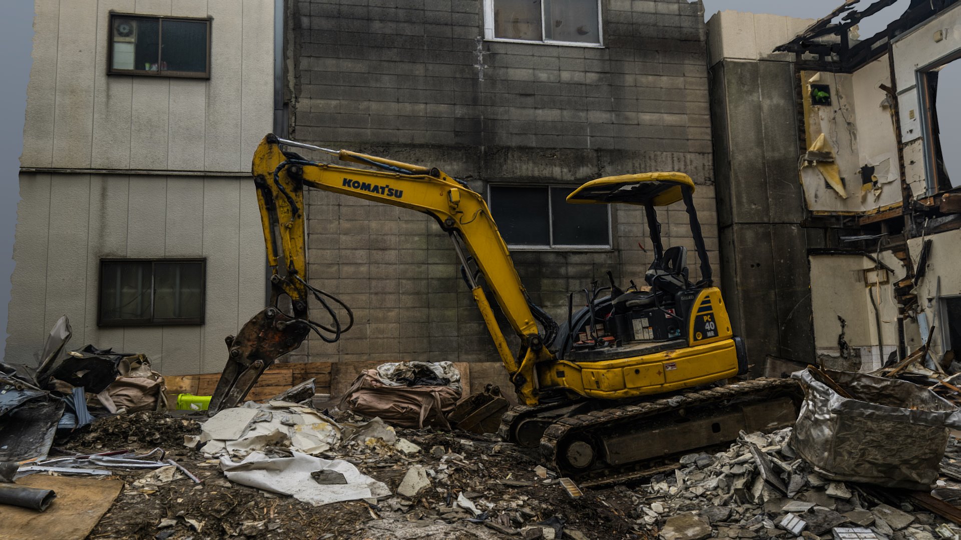 3D model Wrecked house and komatsu excavator scan - This is a 3D model of the Wrecked house and komatsu excavator scan. The 3D model is about a yellow and black forklift in a demolished building.