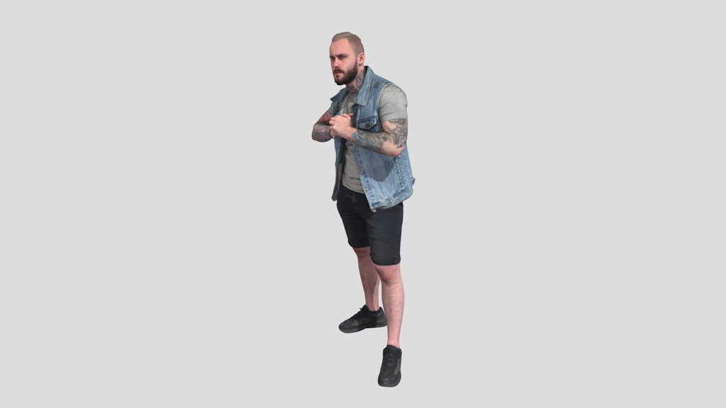 Casual People In A Denim Vest With Tattoos