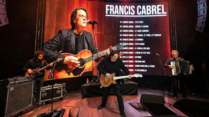Francis-Playing Fendson Guitar