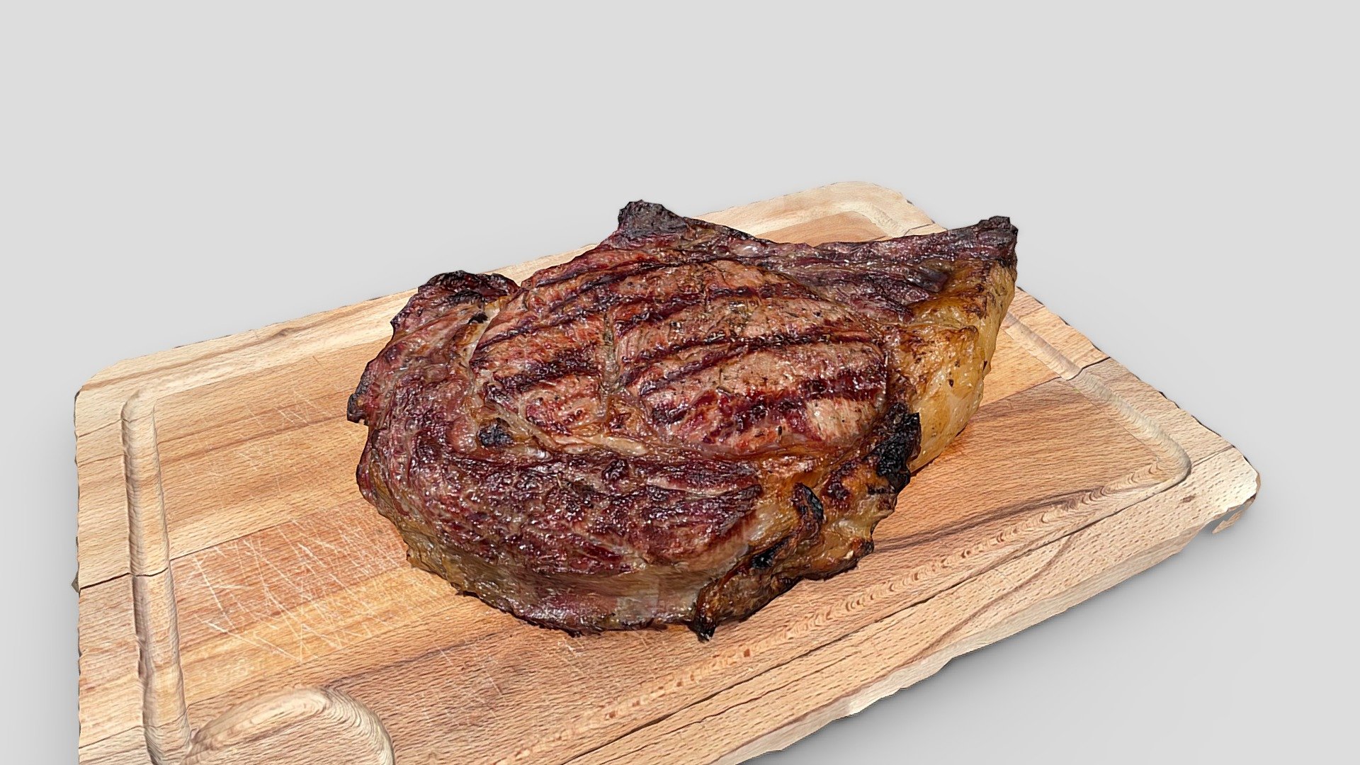 Prime rib on wood board