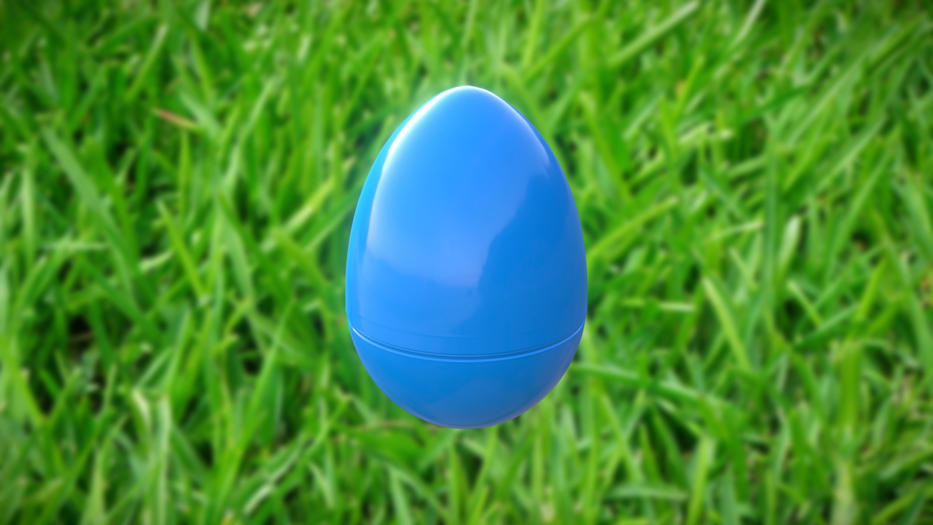 3D model Plastic Easter Egg - This is a 3D model of the Plastic Easter Egg. The 3D model is about a blue ball in the grass.