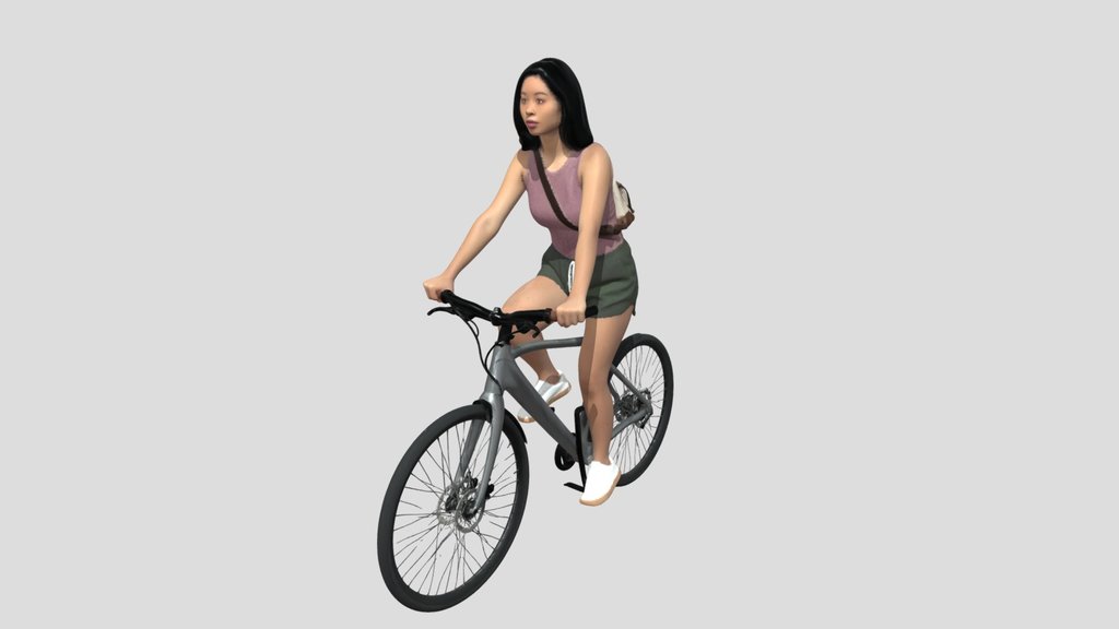 Woman Riding A Gray Bicycle