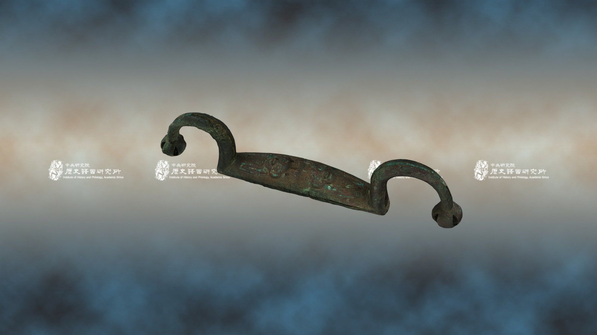 鑲嵌綠松石人形紋弓形器 — Sketchfab embed 3D viewer
