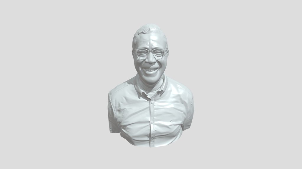 Smiling man in white shirt