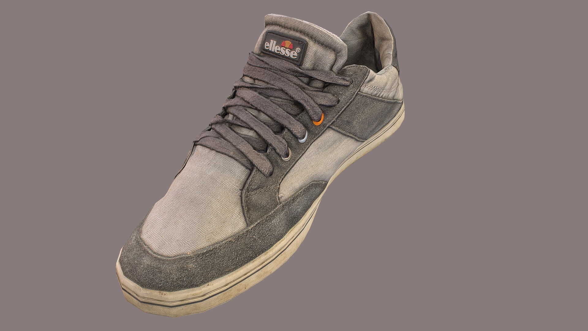 3D model Worn sneaker low poly - This is a 3D model of the Worn sneaker low poly. The 3D model is about a close up of a shoe.