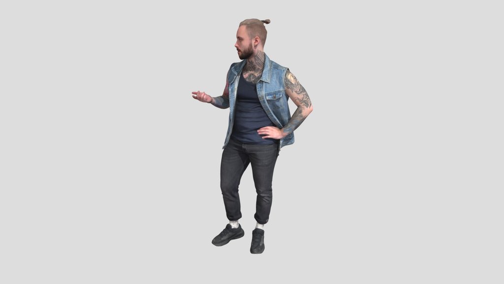 Tattooed Guy In Denim Vest