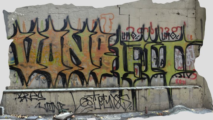 Urban Graffiti Wall with Yellow and Green Tags