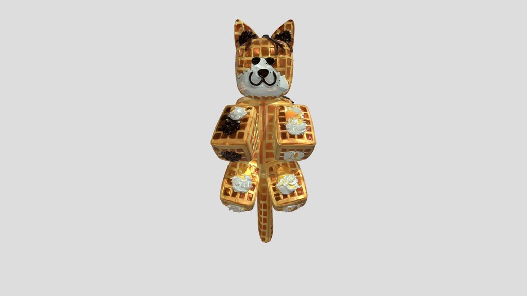 Waffle-shaped cat figurine with toppings