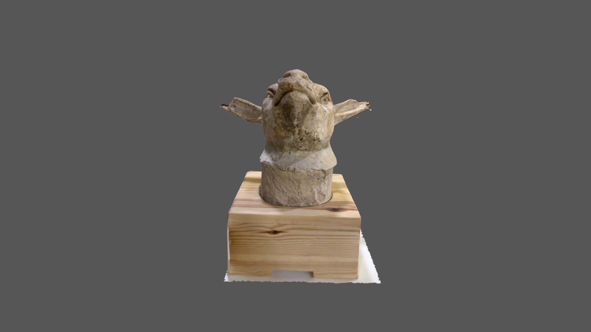 Escultura de cap de cabra