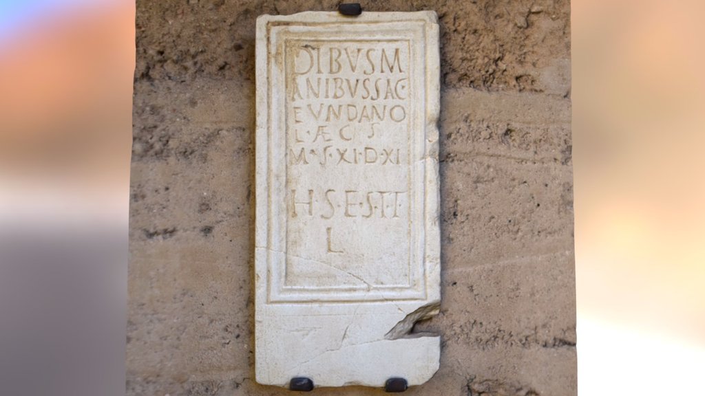 Placa funeraria / Tombstone