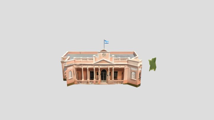 Small pink municipal government building.