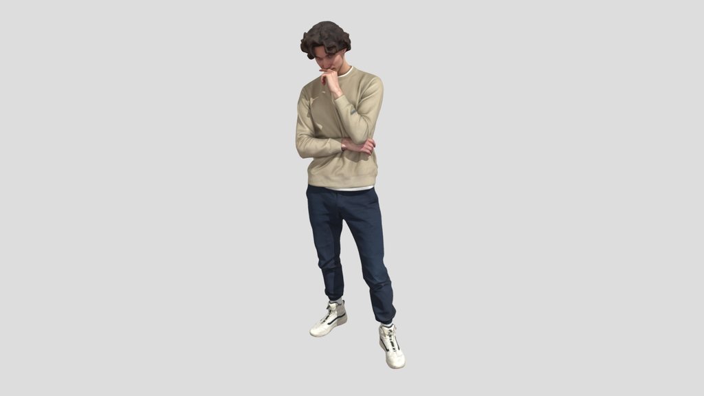 Tall Young Man In A Contemplative Pose