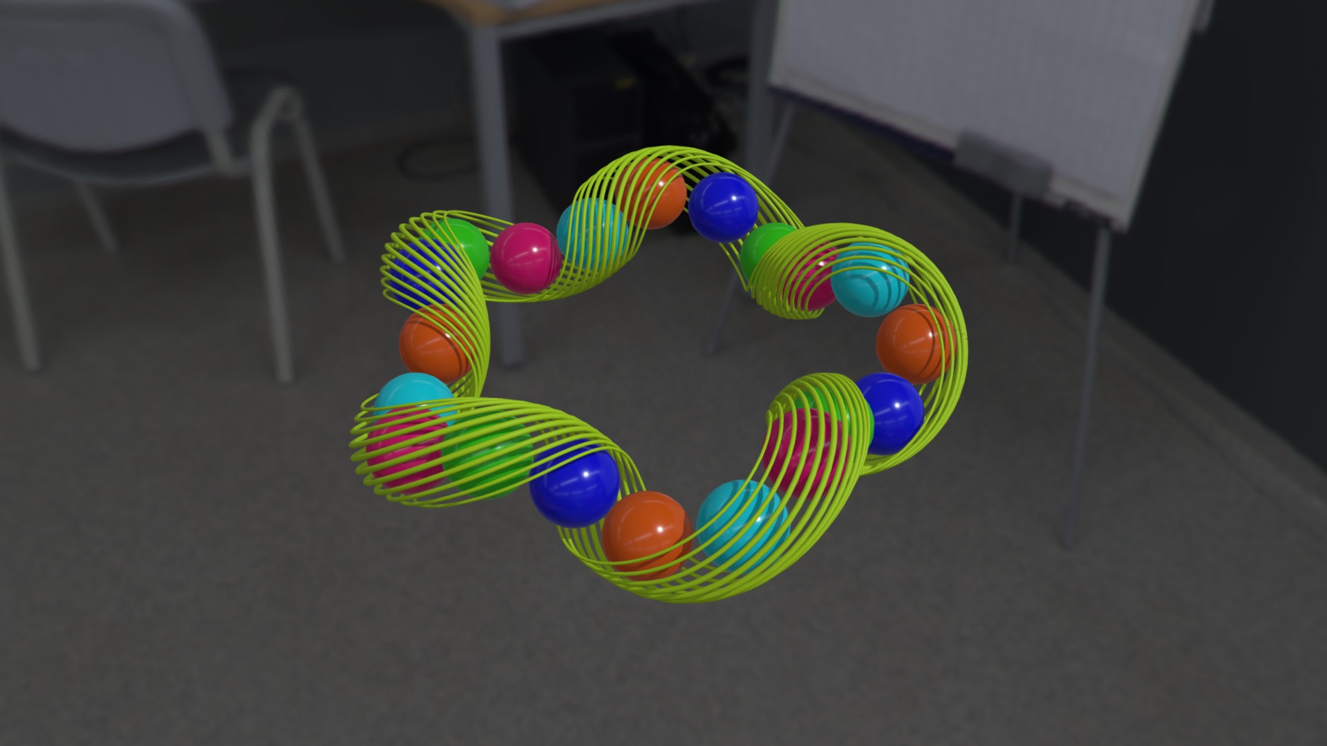 3D model slinky spheres - This is a 3D model of the slinky spheres. The 3D model is about a colorful toy on a table.