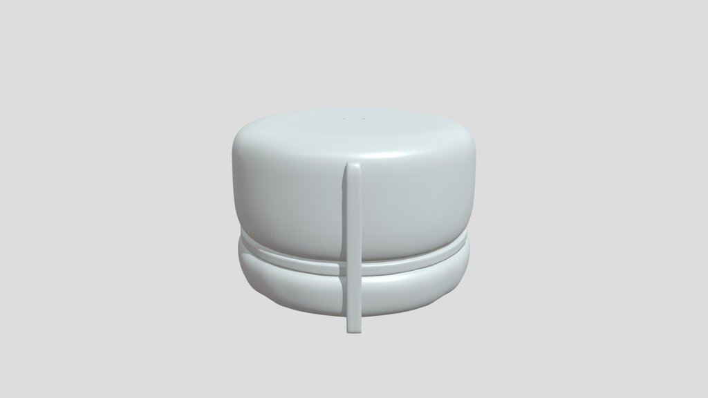 Round plush ottoman with brass band