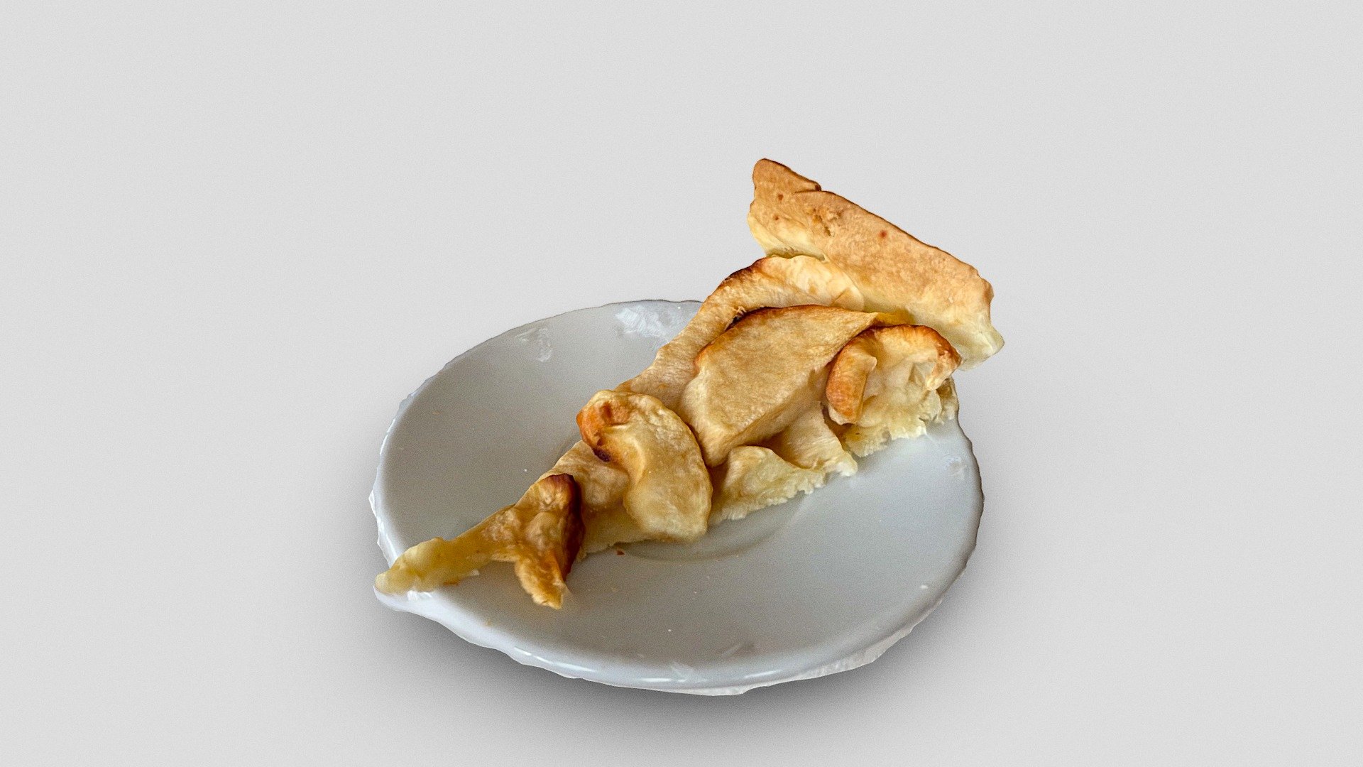 Slice of apple pie on a coffee plate