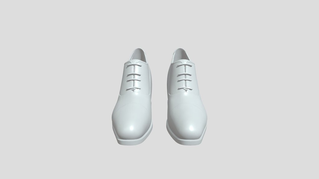 A pair of black leather oxford shoes