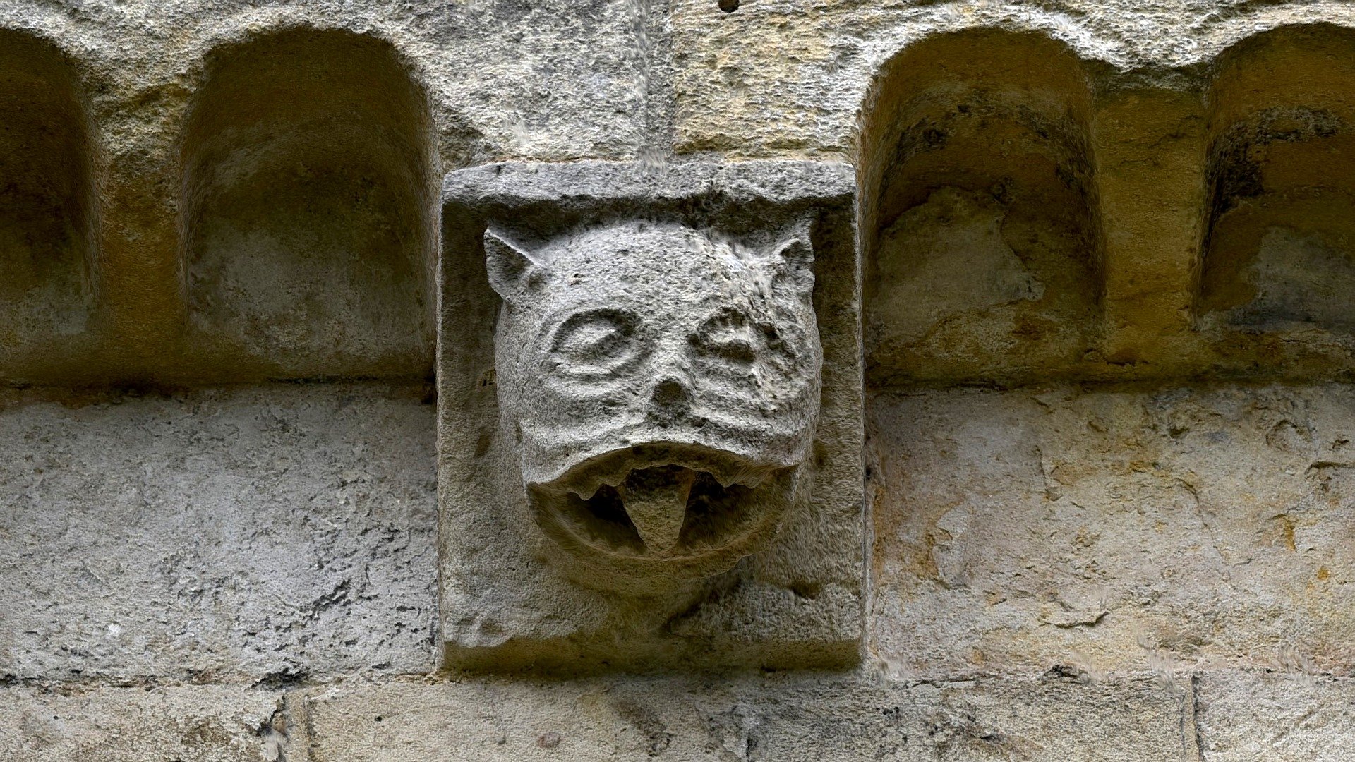 Feline grotesque corbel 8, Romsey Abbey