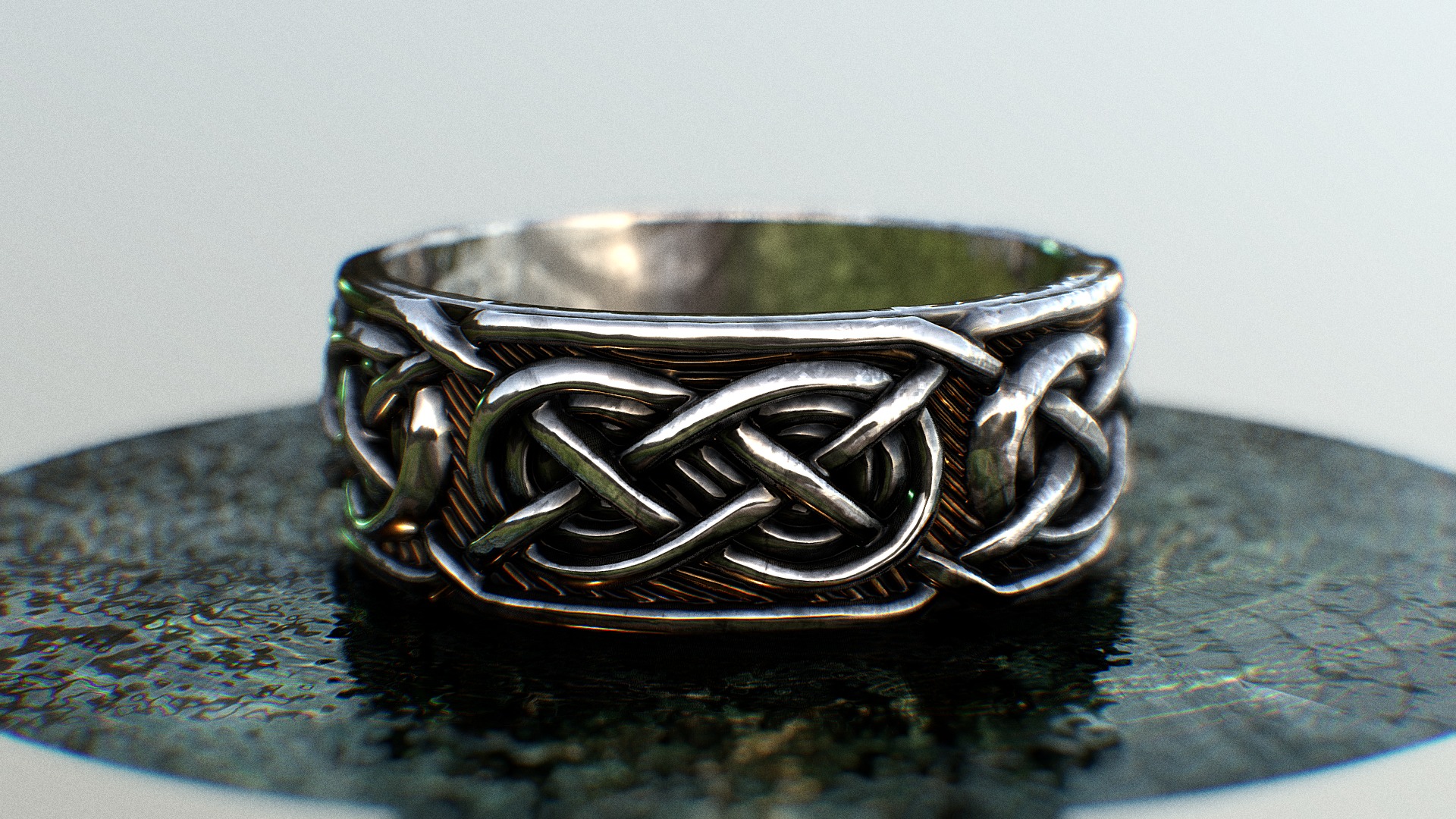 3D model Infinity sign - This is a 3D model of the Infinity sign. The 3D model is about a silver ring on a blue surface.