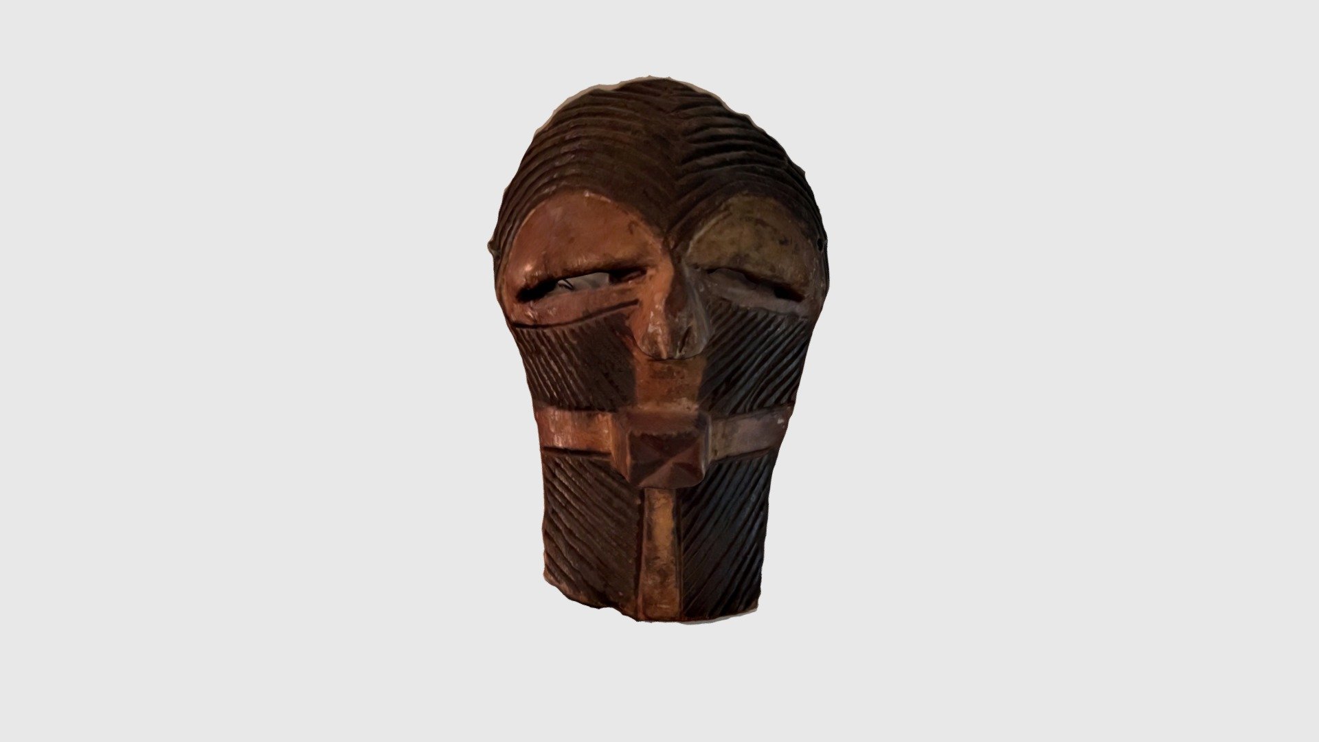 Carved wooden mask