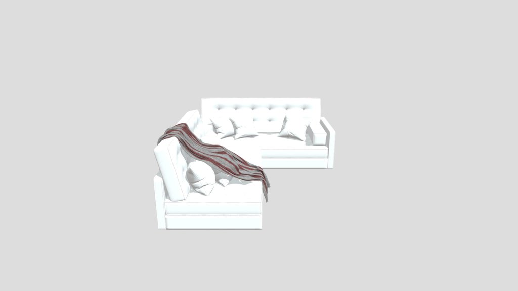 Couch With Pillows And Blanket