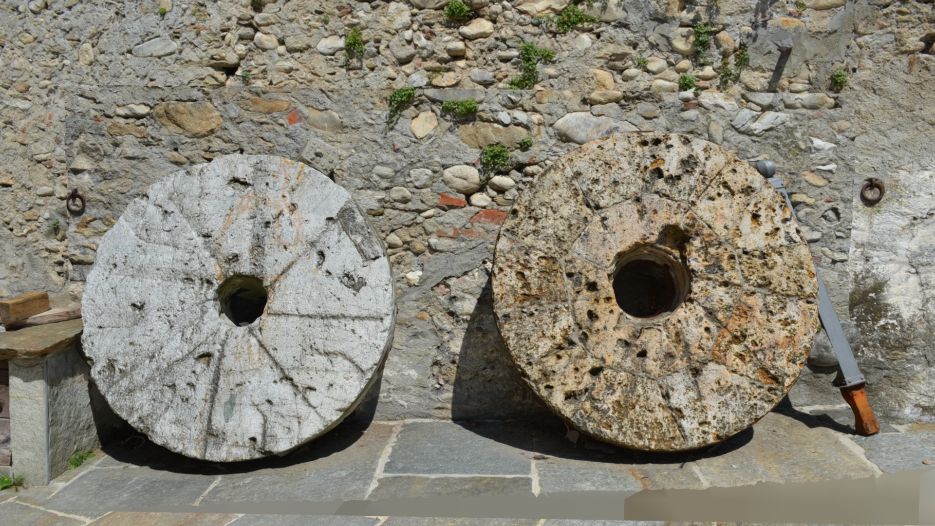3D model Stone Wheels / 3DScan - This is a 3D model of the Stone Wheels / 3DScan. The 3D model is about a couple of round objects with holes in them on a stone surface.
