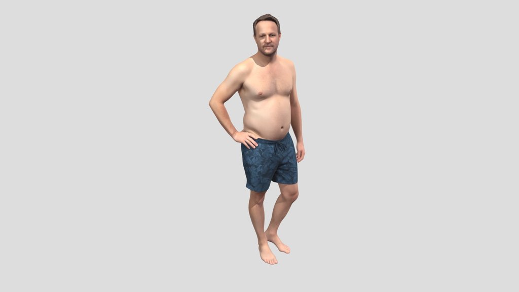 Palm-Print Swim Shorts Pose