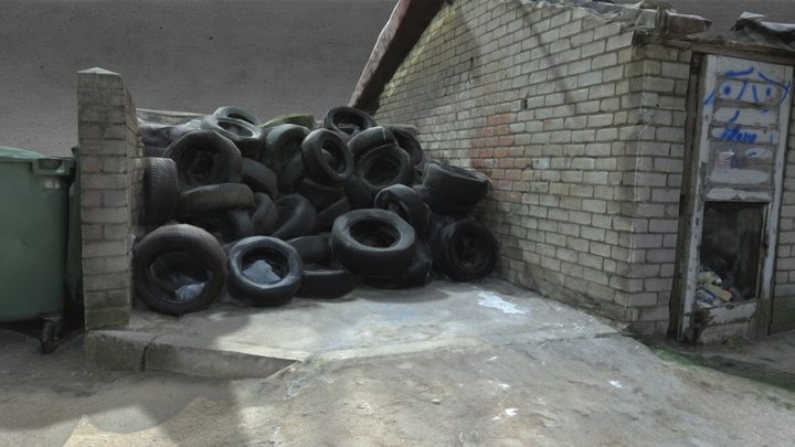Pile of Old Tires and Abandoned Storage Shed