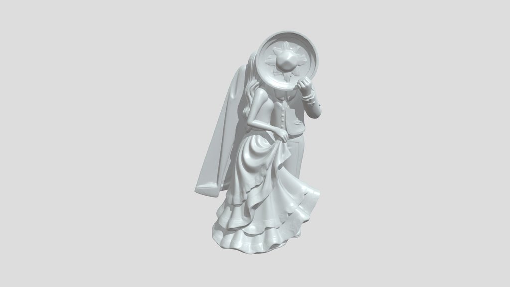 Bride and groom figurine in wedding attire