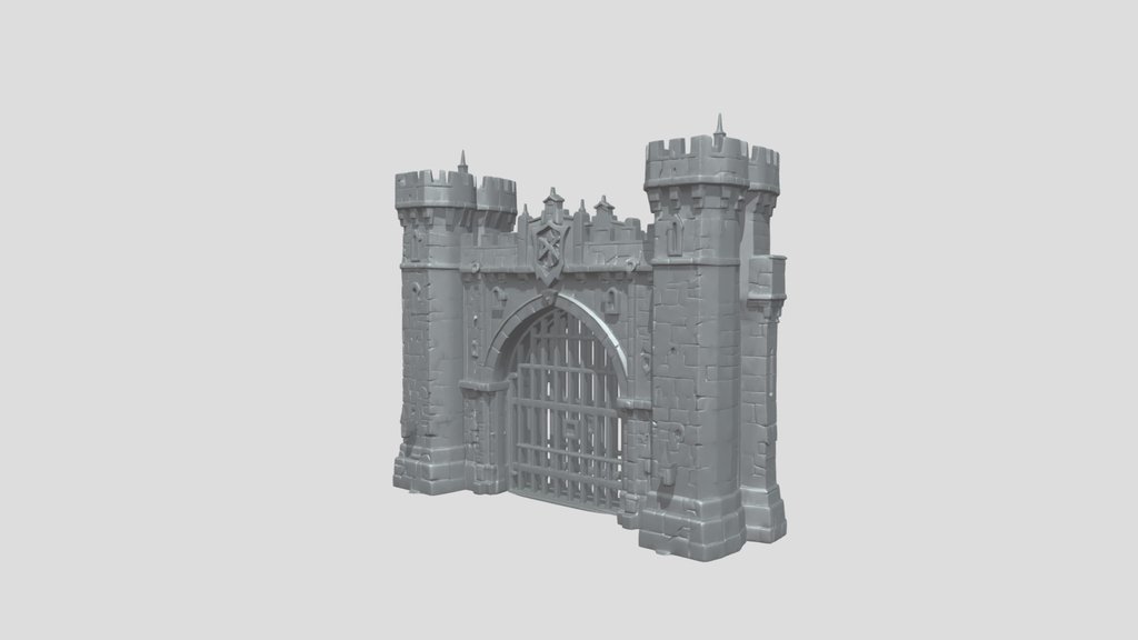 Stone castle gate with towers and portcullis