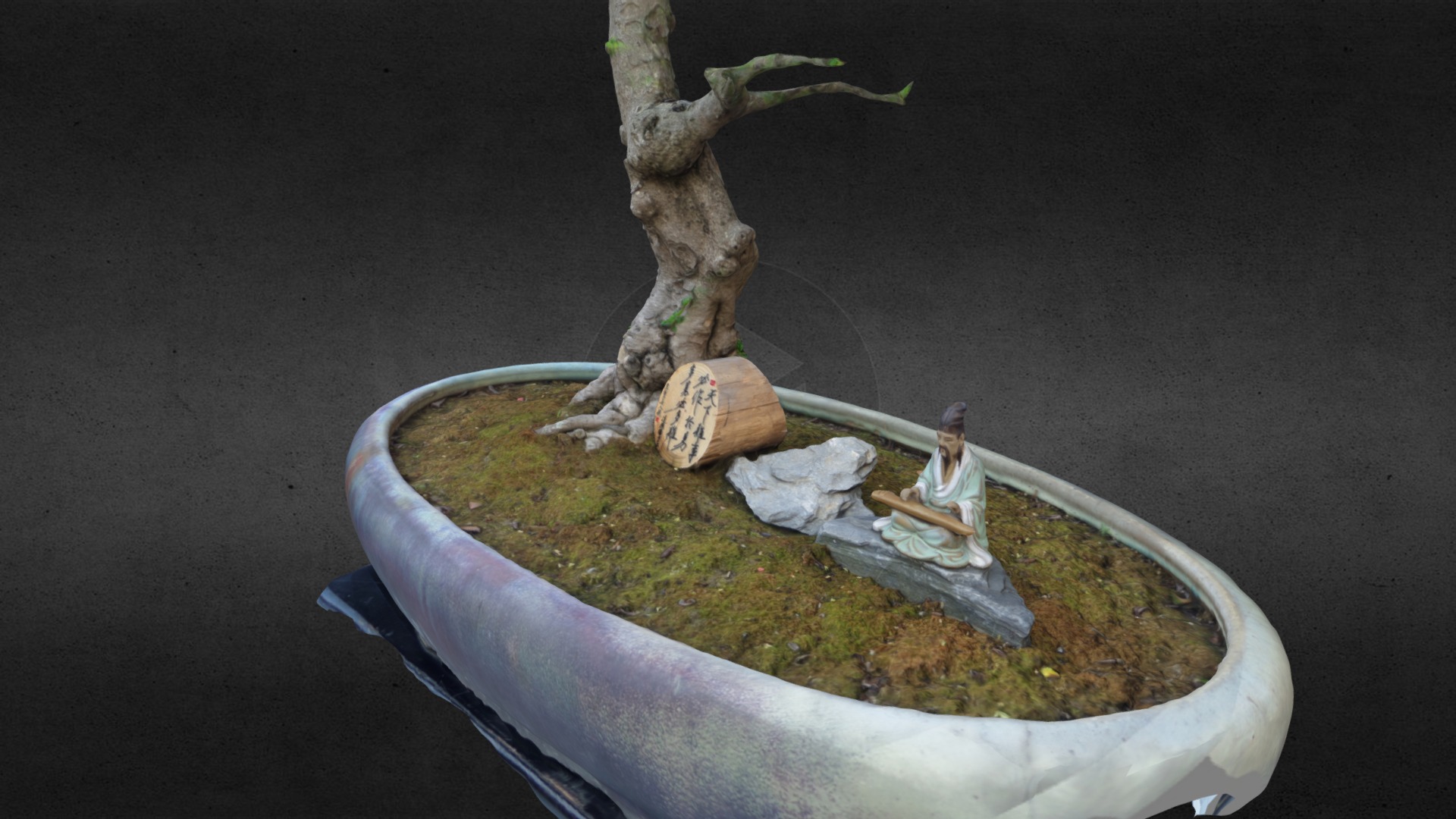 3D model Bonsai - This is a 3D model of the Bonsai. The 3D model is about a tree stump with a statue of a person sitting on it.