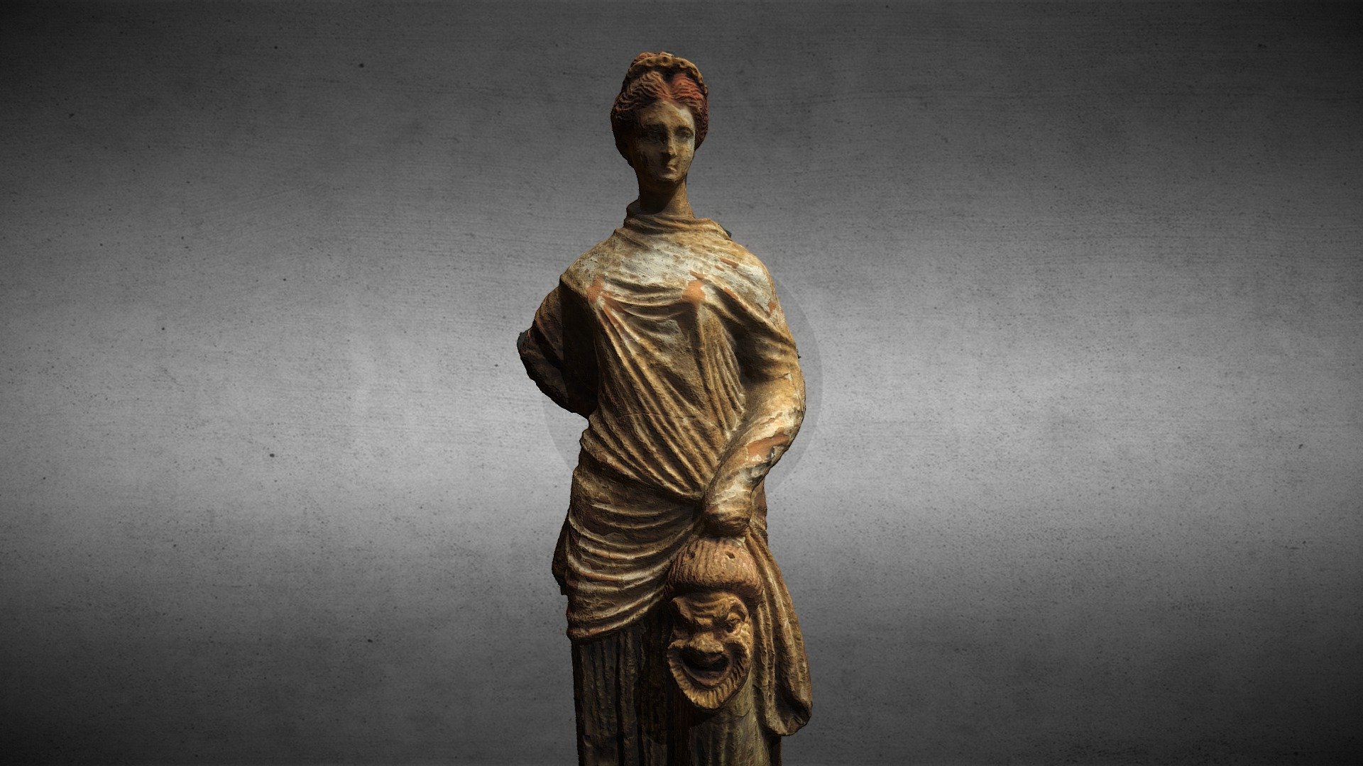 Woman holding a comedy mask