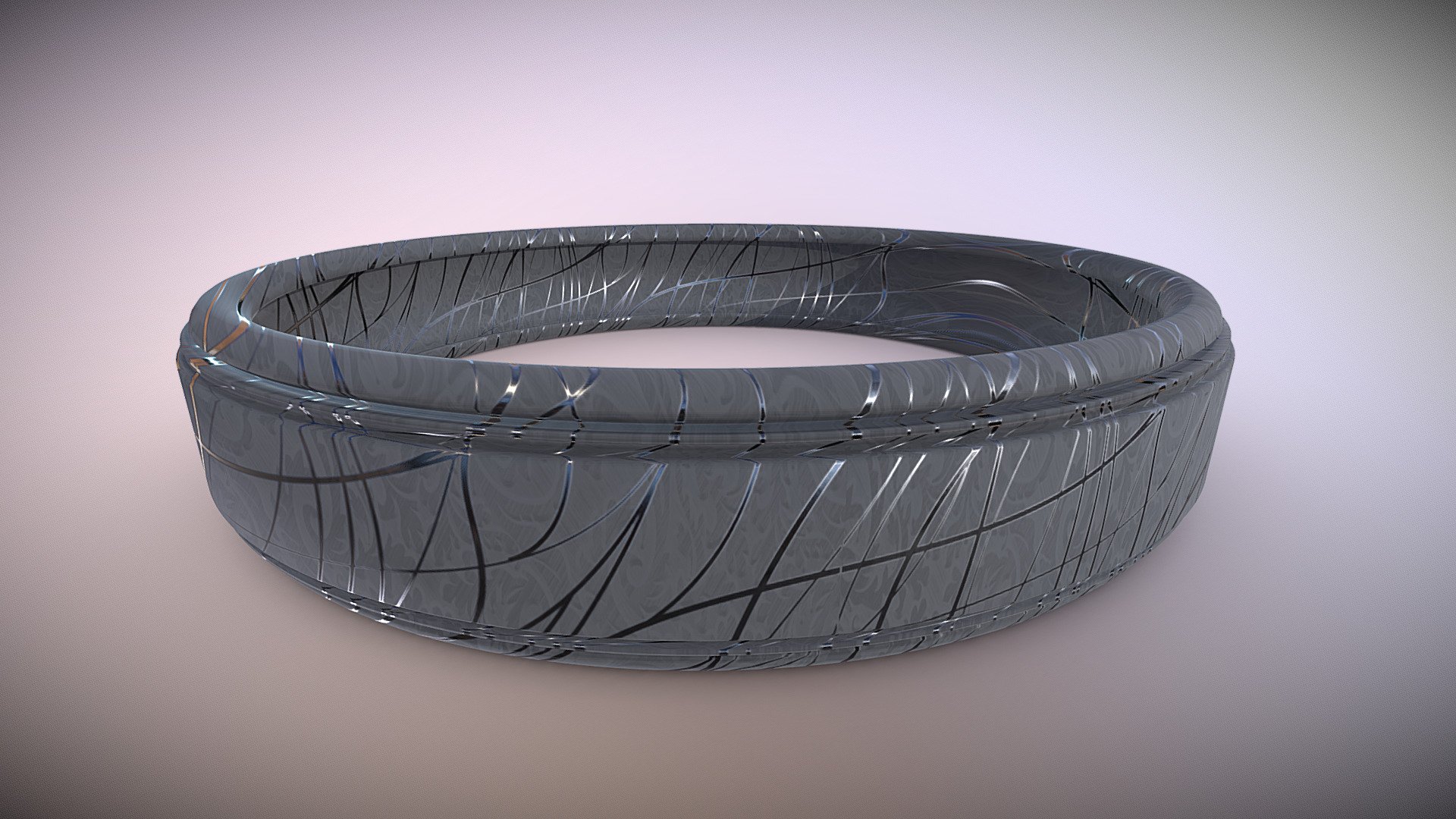 Gray ring with engravements