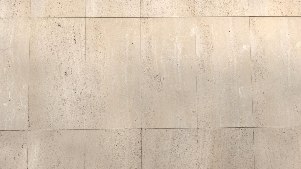 Pale travertine building facade