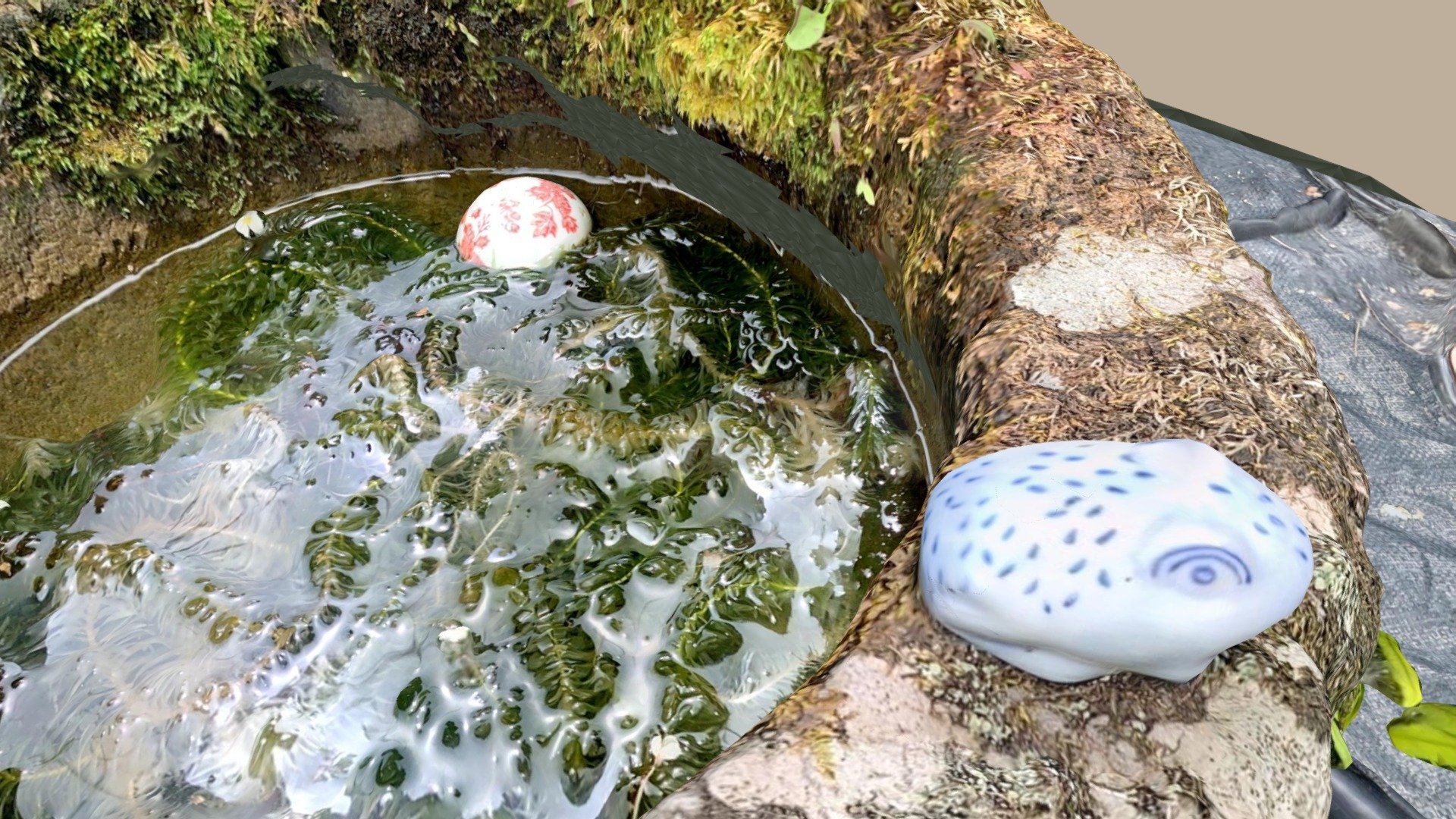 stone bucket in the garden of the house