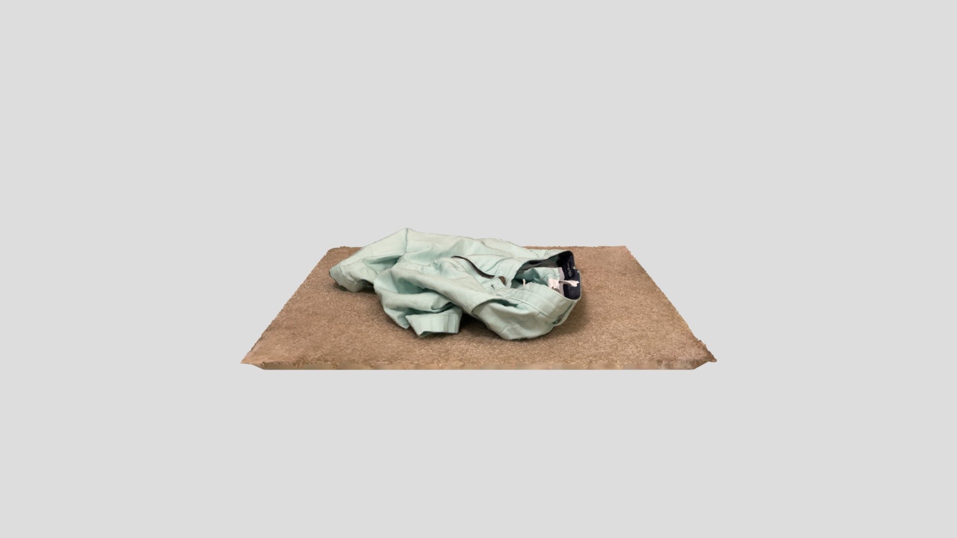 Crumpled up shorts on the floor