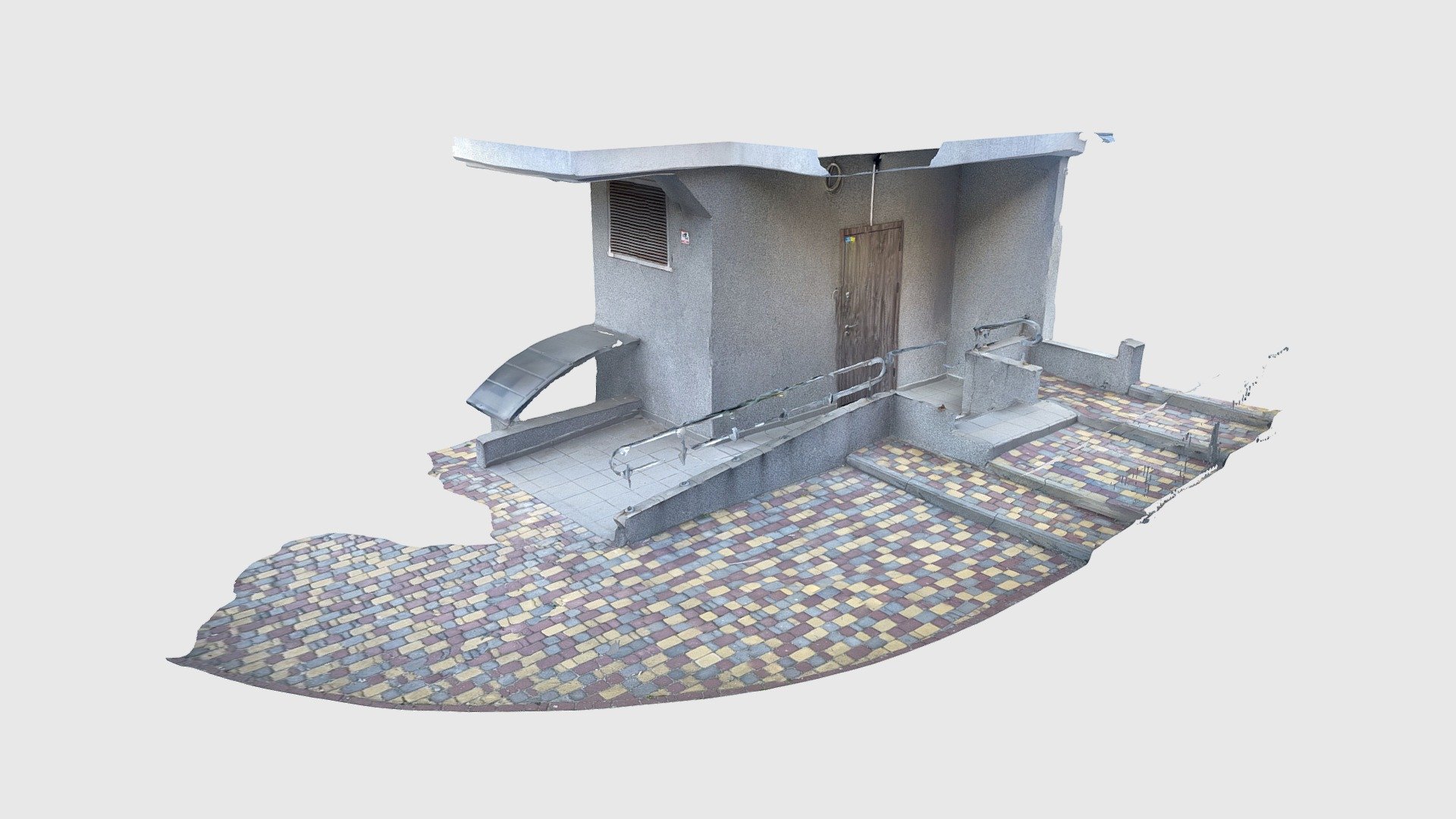 Concrete house corner with pavement tiles
