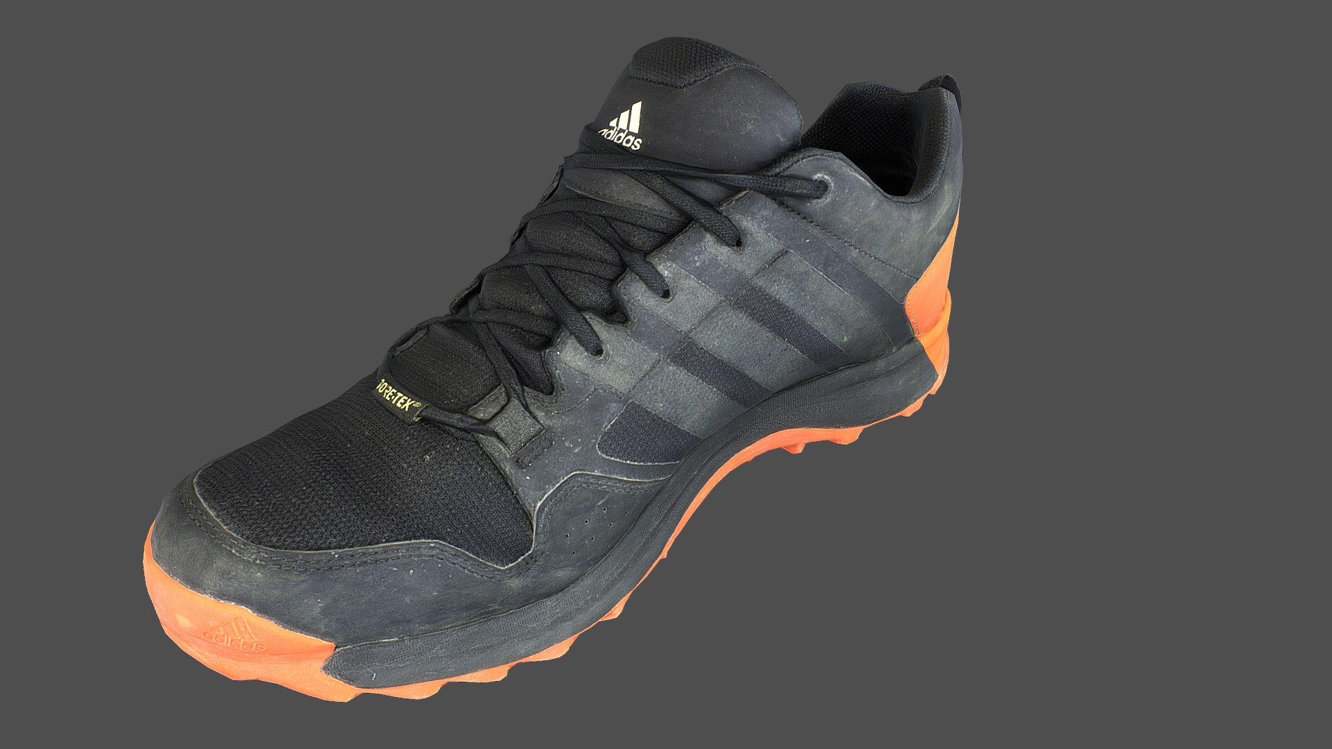 3D model Adidas sneaker shoe low poly 3D model - This is a 3D model of the Adidas sneaker shoe low poly 3D model. The 3D model is about a black tennis shoe.