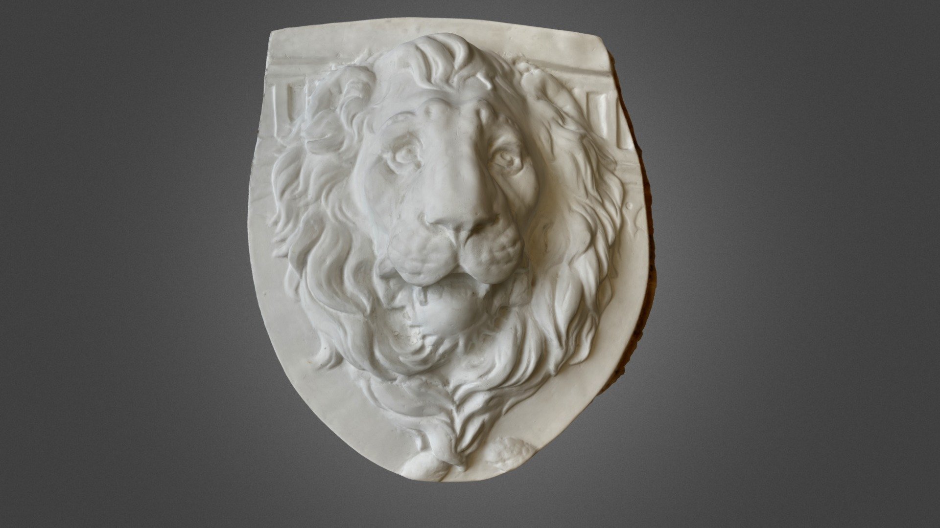 Plaster lion sculpture