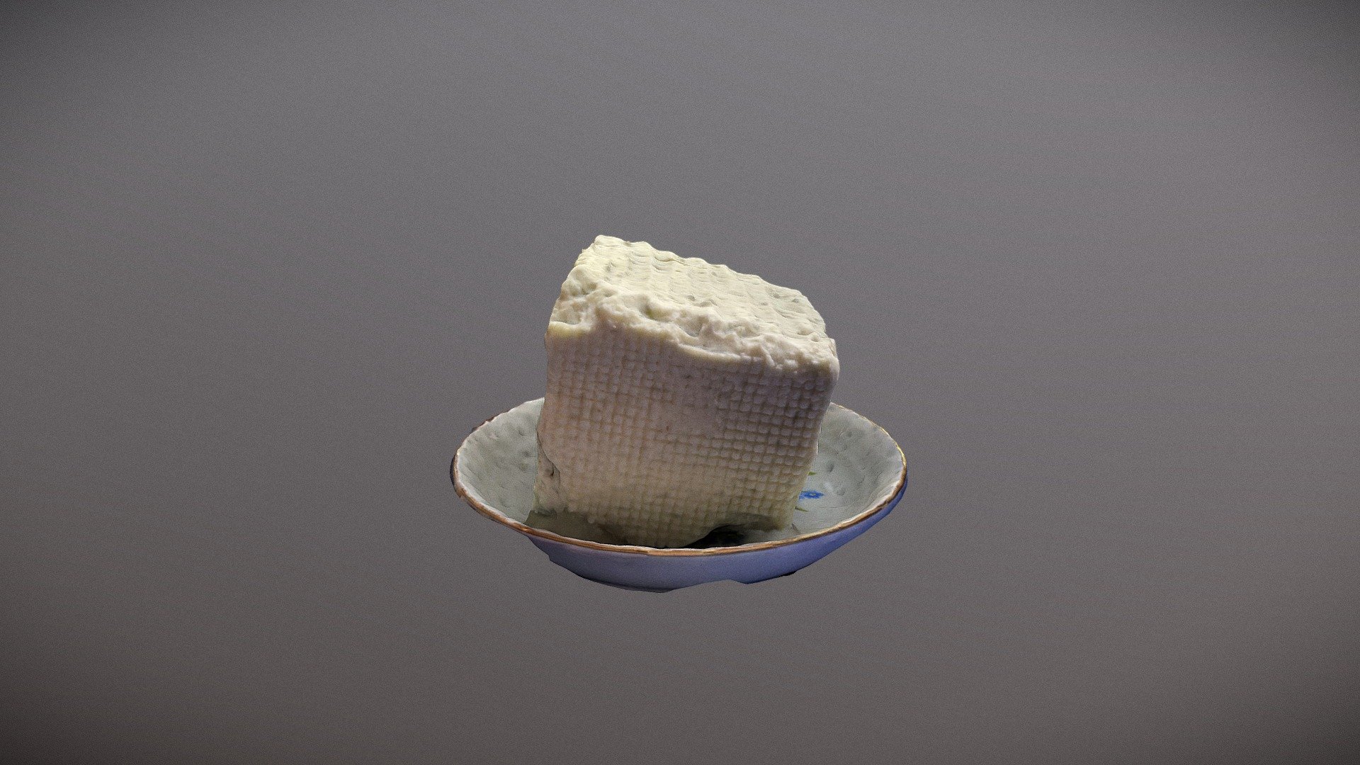 Piece of Cheese on a plate