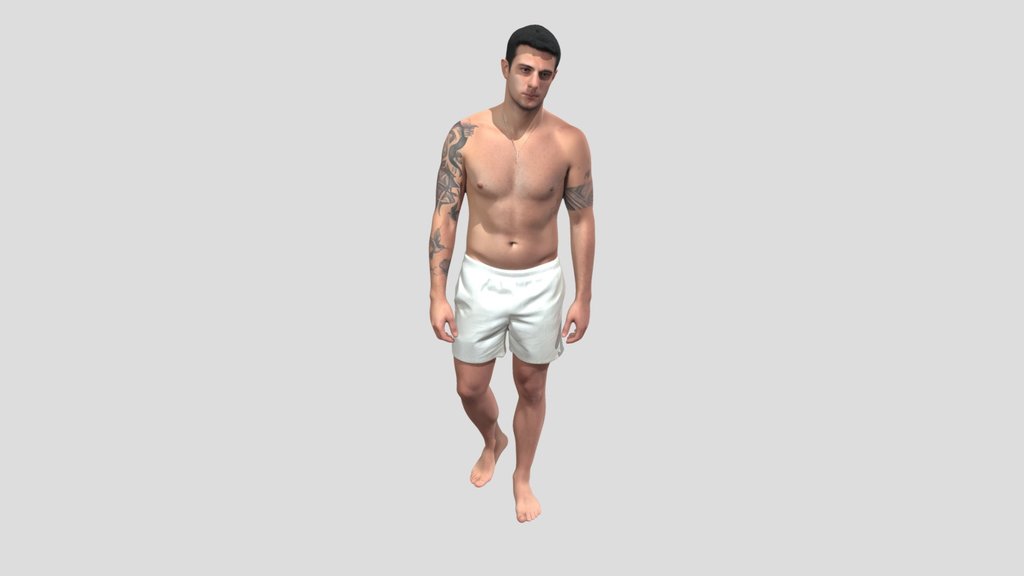 Tattooed Man in White Shorts