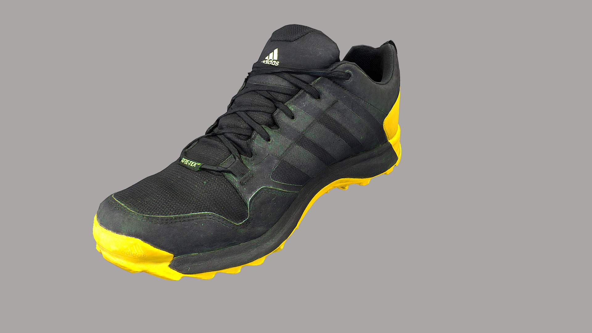 3D model Adidas sneaker shoe low poly - This is a 3D model of the Adidas sneaker shoe low poly. The 3D model is about a black and yellow shoe.