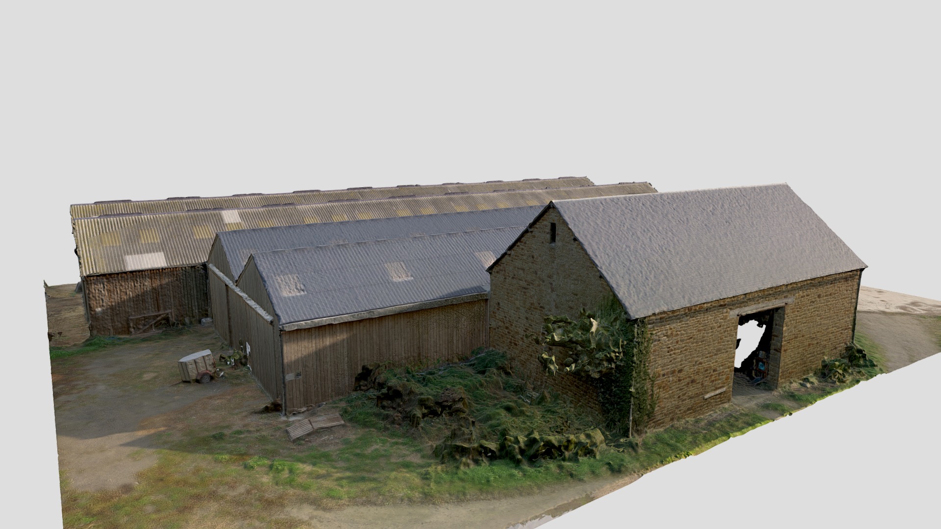 3D model Ferme des Obiones – Bâti 4/4 - This is a 3D model of the Ferme des Obiones - Bâti 4/4. The 3D model is about a couple of buildings with grass and bushes in front of them.