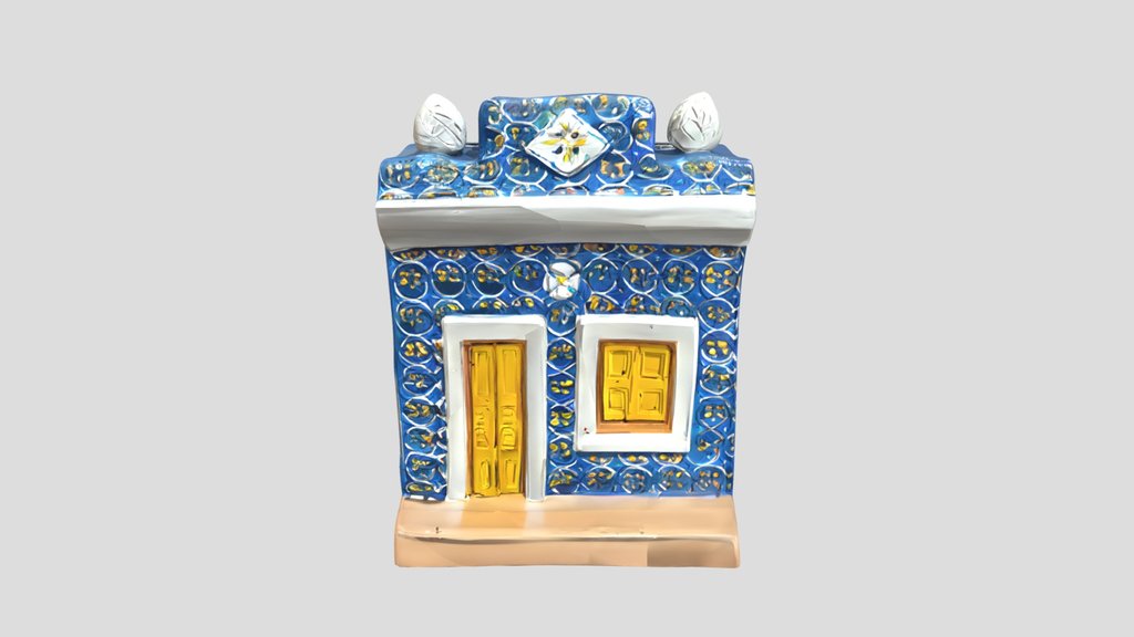 A small blue house model