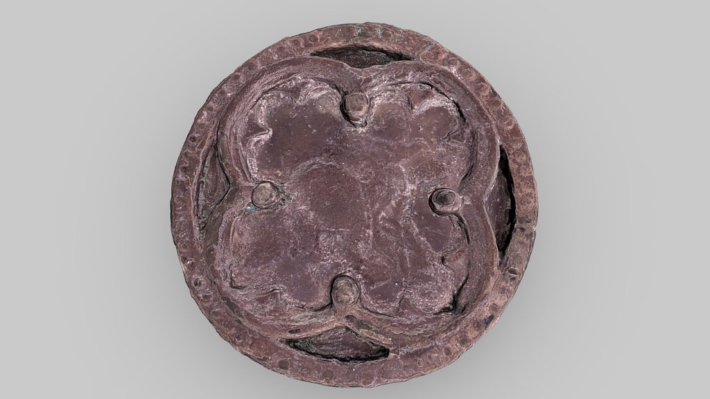 Disc shaped part of a metal vessel