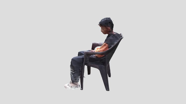 a_young_boy_is_sitting 3D Model