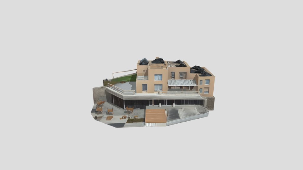 hotel oceano building with outdoor patio.