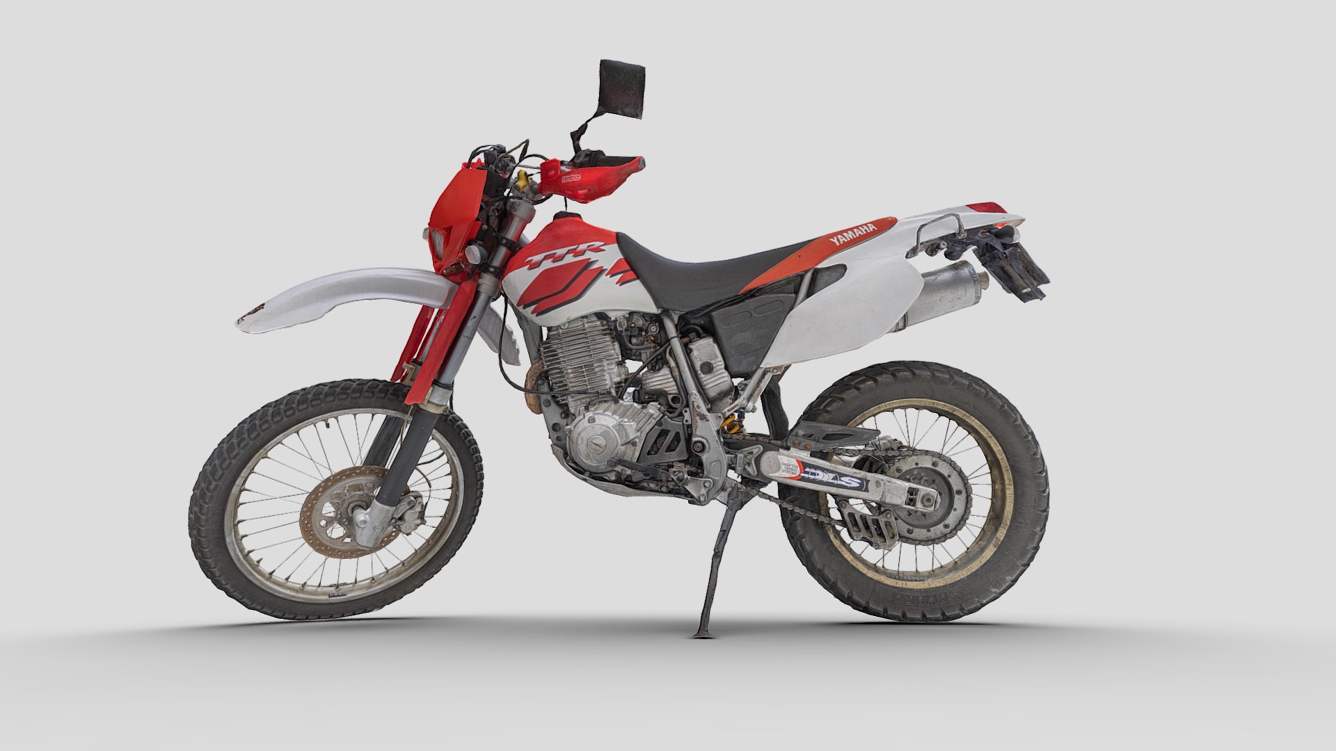 3D model Yamaha TTR  600 cc – (1999) - This is a 3D model of the Yamaha TTR  600 cc - (1999). The 3D model is about a red dirt bike.