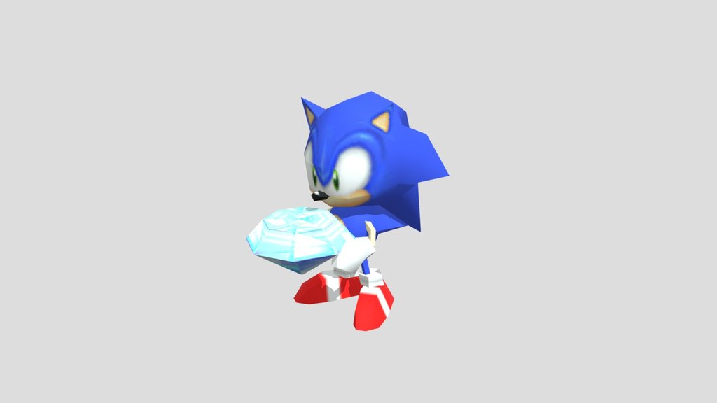 Sonic holding a blue chaos emerald